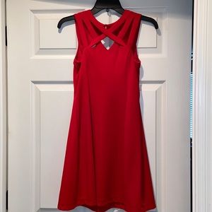 Short red dress with detailed neckline